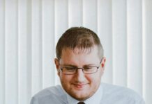 Career Adventures: Unique Career Paths and Experiences man in white dress shirt using silver dell laptop