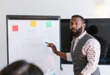 Historical Journeys: Fascinating Tales from the Past Brought to Life bearded man presenting in front of people