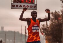 Athletic Achievements: Inspiring Tales of Persistence and Victory in Sports photo of an athlete raising his hands