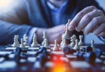 Mindful Work Habits: Enhancing Productivity and Focus person playing chess