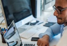 The Art of Delegation: Empowering Others to Lighten Your Workload boss delegating tasks to employee