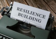 Building Resilience: Bouncing Back Stronger from Adversity a typewriter with the word resilience building on it