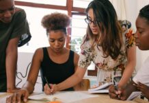 Creative Pursuits: Artists, Writers, and Innovators Share Their Paths to Success woman writing in paper