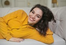Overcoming Shyness: Strategies for Stepping Out of Your Comfort Zone woman in yellow button up top