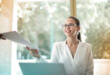 Smart Goals Examples for Work positive businesswoman doing paperwork in office