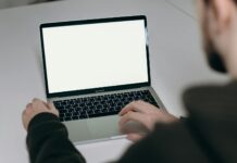 5 Ways to Increase Productivity in the Workplace person using macbook air on white table