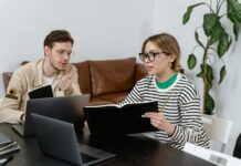 Personal Development Plan for Work man and woman discussing in workplace