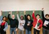 Poor Students Success Stories people raising their hands