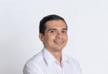 What is an Example of a Success Story? smiling man in white shirt