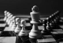 What is Goal Setting Meaning? set of chess pieces in daylight