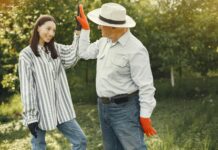 The Five Elements of Happiness happy young woman and old man farmers giving high five