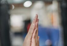 What are the 5 R’s of Goal Setting? crop faceless people clapping hands in room