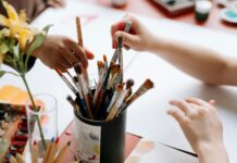 How can I get 100% productive? people getting paintbrushes from the can